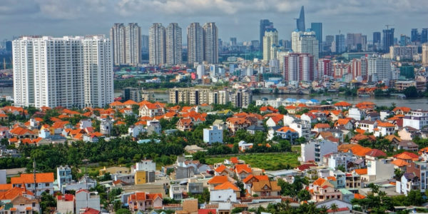 HO CHI MINH CITY ( SAI GON), VIET NAM- SEP 15: Development of mordern city with row of highrise buidling rise up to sky and new urban with villas along river in Ho Chi Minh, Vietnam on Sep 15, 2012